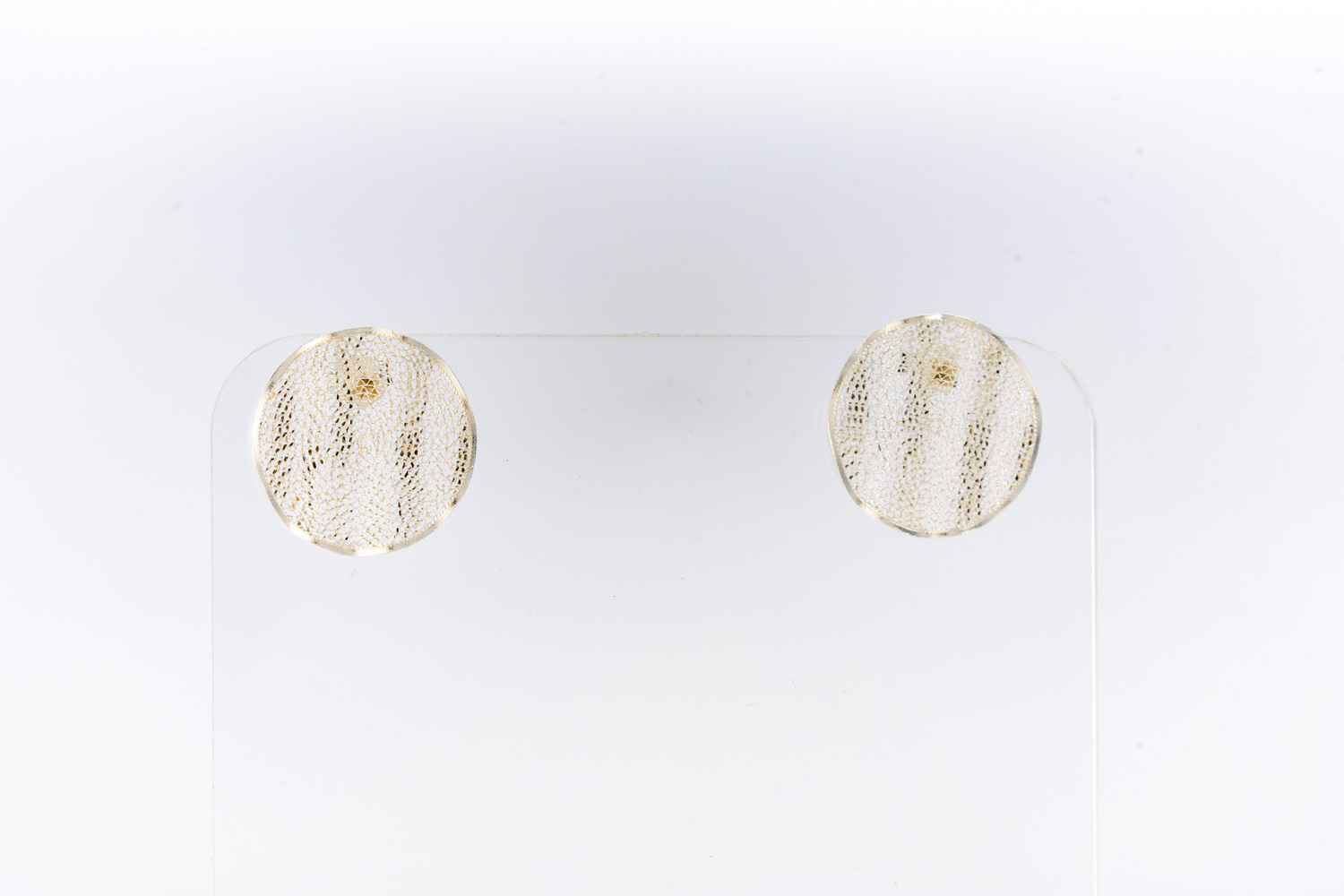 Aretes redondos ondulados de plata